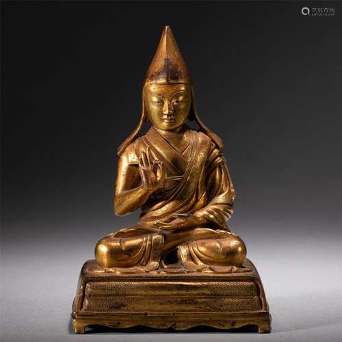 A GILT BRONZE FIGURE OF BUDDHA STATUE