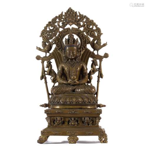 A BRONZE SEATED FIGURE OF BUDDHA