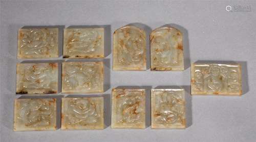 A GROUP OF CARVED JADE PANELS