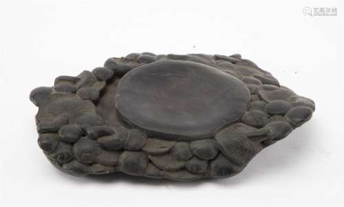 A CARVED INKSTONE