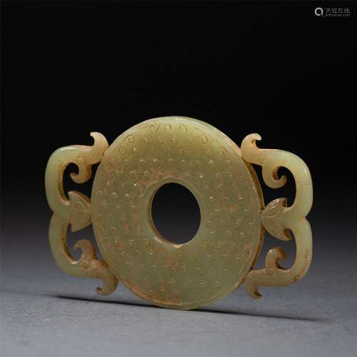 A YELLOW JADE BI ORNAMENTS