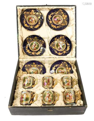 A Cased Vienna Style Porcelain Six Place Coffee Set, first h...