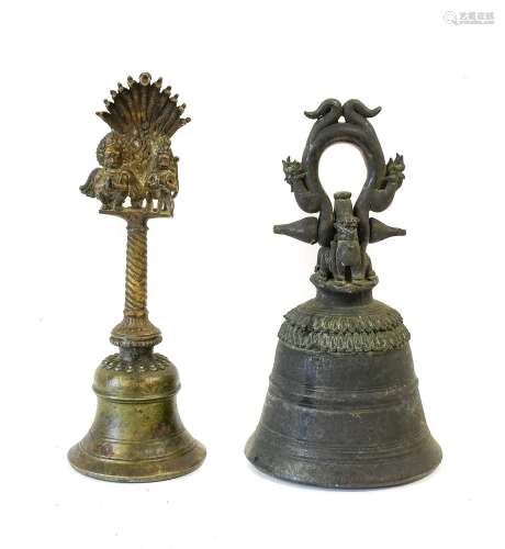 An Indian Bronze Bell, with fan cresting of figures of Garud...
