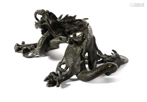 A Chinese Bronze Figure of a Dragon, 19th century, the five-...