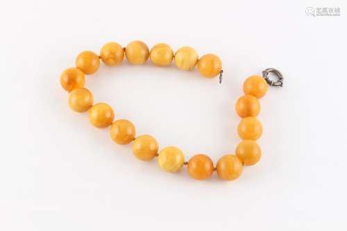 Property of a lady - a good butterscotch amber bead necklace...