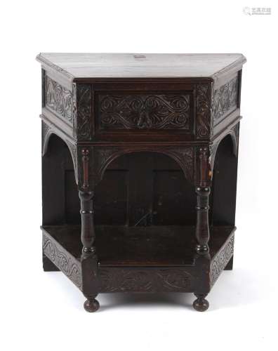 Property of a deceased estate - a carved oak credence table,...