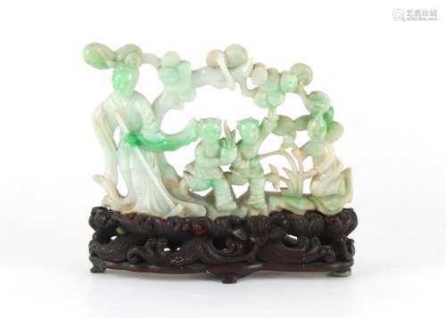 A late 19th / early 20th century Chinese jadeite carving dep...