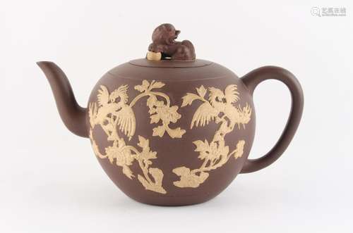 Property of a lady - a Chinese Yixing teapot, slip decorated...