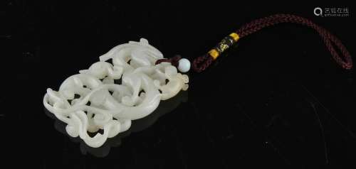 Property of a lady - a Chinese carved white jade chilong pen...
