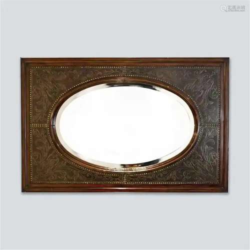 A Theodore Alexander copper mirror