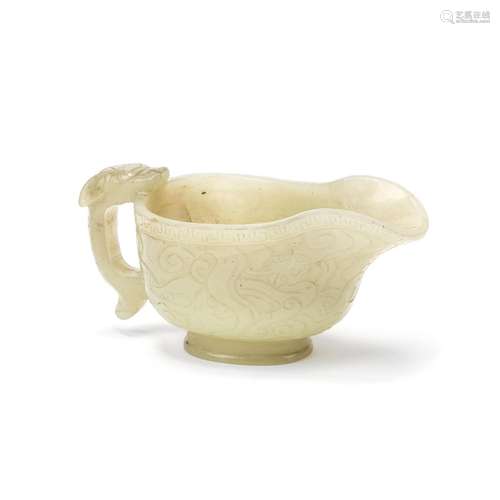 A PALE CELADON JADE 'CHILONG' POURING VESSEL, YI Ming Dynast...