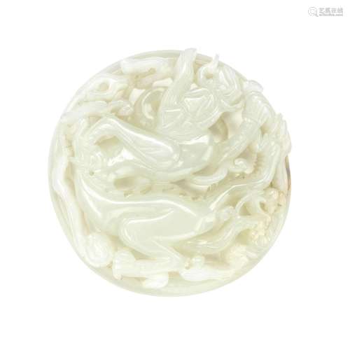 A RETICULATED WHITE JADE CIRCULAR 'DRAGON' PLAQUE Ming Dynas...