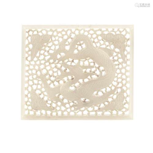A CARVED AND PIERCED WHITE JADE 'DRAGON' PLAQUE Ming Dynasty