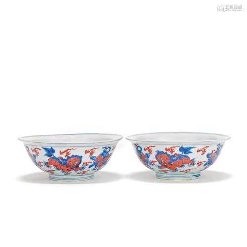 A PAIR OF BLUE AND WHITE AND COPPER RED BOWLS Qianlong seal ...