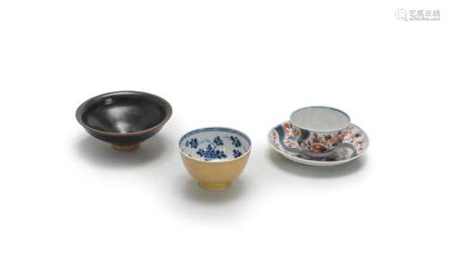A BLACK-GLAZED TEABOWL, A CHINESE IMARI CUP AND SAUCER AND A...