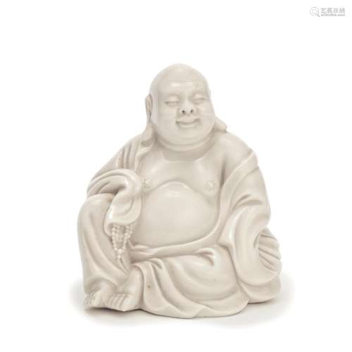 A BLANC-DE-CHINE MODEL OF BUDDHA Impressed He Chaochun seal ...