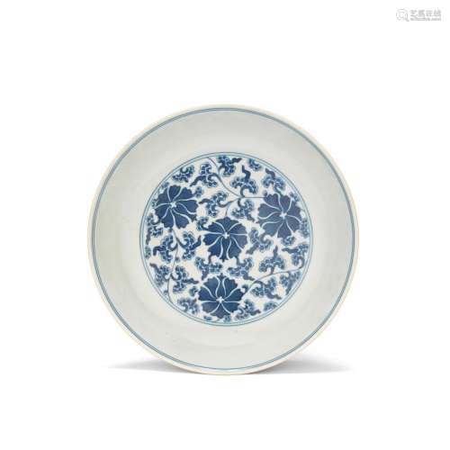 A BLUE AND WHITE FLORAL DISH Jiaqing six-character seal mark...