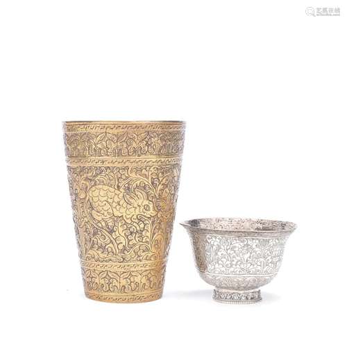 A TIBETAN SILVER BOWL AND AN INDIAN BRASS BEAKER 19th centur...