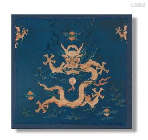 A BLUE-GROUND SILK EMBROIDERED 'DRAGON' PANEL 18th century