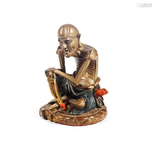 A FOOCHOW LACQUER EMACIATED LUOHAN FIGURE Early 20th Century