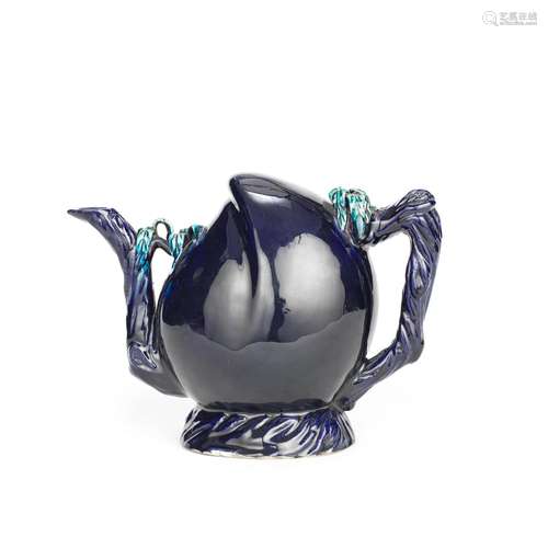 A LARGE AUBERGINE-GLAZED CADOGAN TEAPOT Kangxi