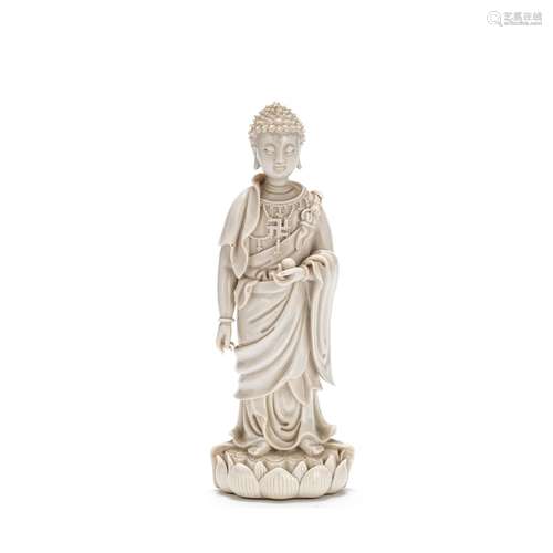 A BLANC-DE-CHINE STANDING FIGURE OF BUDDHA 19th century, He ...