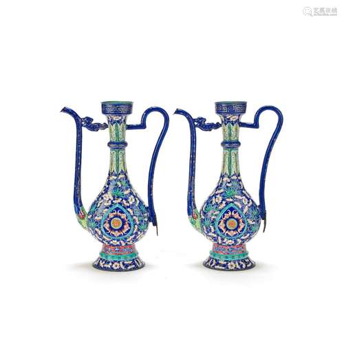 A PAIR OF PAINTED ENAMEL EWERS 19th century (2)