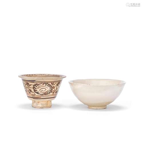 AN IVORY GLAZED BOWL AND A CIZHOU CUP Late 14th century (3)