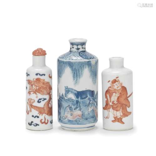 THREE BLUE AND WHITE AND IRON-RED SNUFF BOTTLES 19th/20th ce...