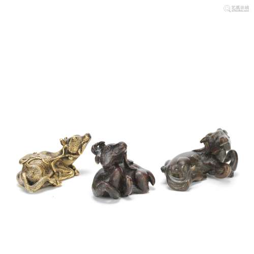 THREE BRONZE 'ANIMAL' SCROLL WEIGHTS Ming Dynasty, 17th Cent...