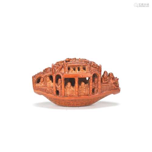 AN INSCRIBED NUT CARVING OF A BOAT Qing Dynasty