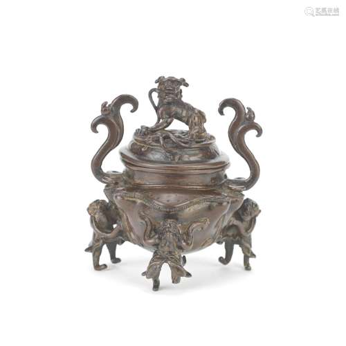 A BRONZE 'FOREIGNERS' INCENSE BURNER AND COVER Yuan Dynasty
