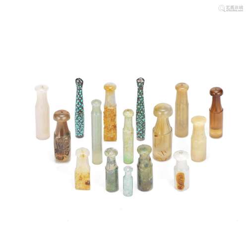 A LARGE GROUP OF JADE, HARDSTONE AND METAL MOUTHPIECES 19th/...