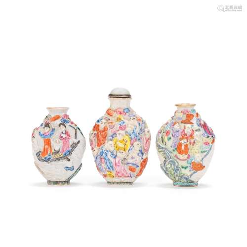 THREE MOULDED PORCELAIN SNUFF BOTTLES Jiaqing marks and of t...