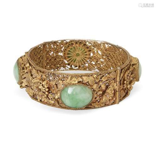 A Chinese jadeite-inset silver-gilt filigree bracelet<br />
...