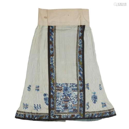 A Chinese silk embroidered pale blue ground skirt<br />
<br ...