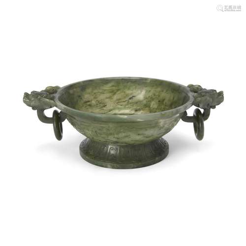 A Chinese spinach jade twin-handled bowl<br />
<br />
Qing d...