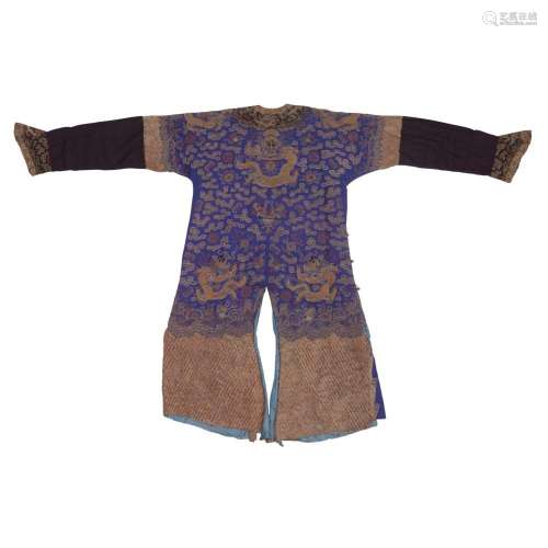 A Chinese embroidered silk purple-ground 'nine dragon' robe,...