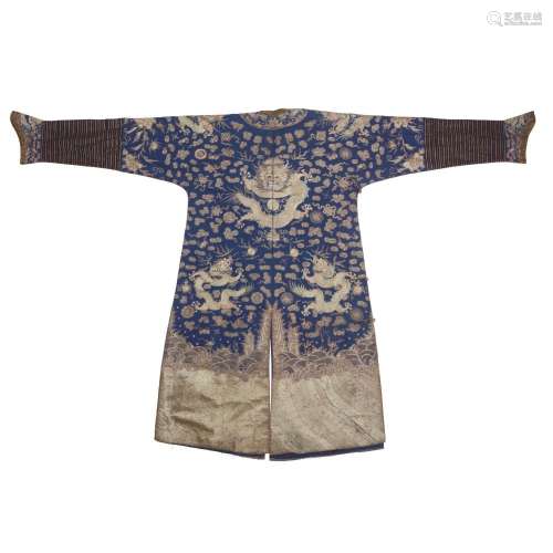 A Chinese blue-ground 'dragon' robe<br />
<br />
Late Qing d...