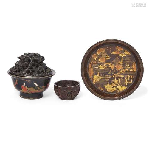 A group of four Chinese carved wood and lacquer objects<br /...