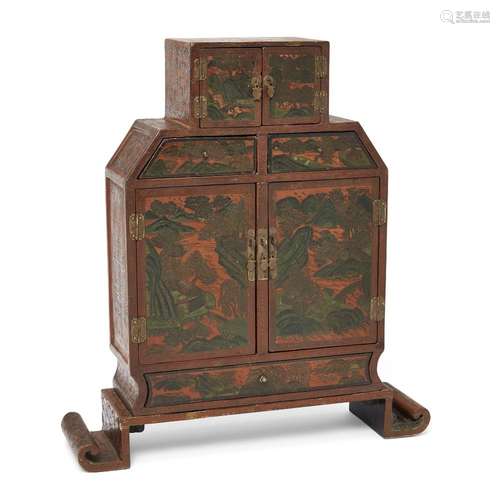 A rare Chinese tianqi lacquer 'landscape' shaped cabinet<br ...