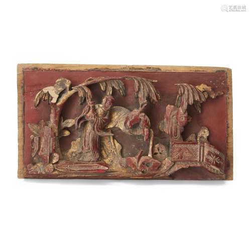 A Chinese gilt-painted red lacquered wood plaque<br />
<br /...