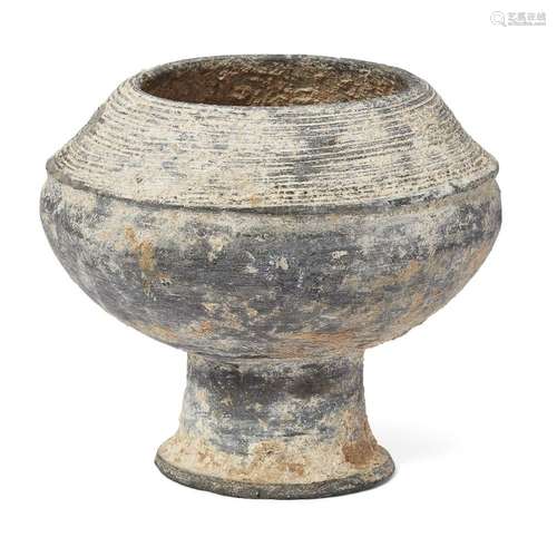 A Thai Ban Chiang-type burnished dark grey pottery stem bowl...