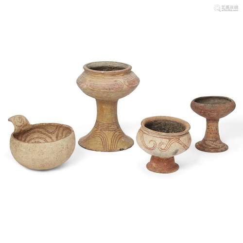 Three Thai painted pottery 'Ban Chiang' stem bowls and a han...