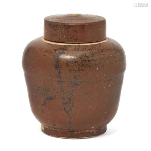 A Chinese russet and brown-glazed jar and cover <br />
<br /...