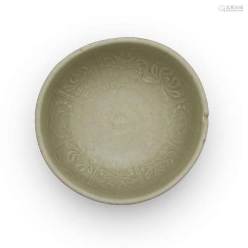 A Chinese carved Longquan-celadon-glazed bowl<br />
<br />
M...