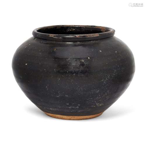 A large Chinese black glazed jar<br />
<br />
Ming dynasty<b...
