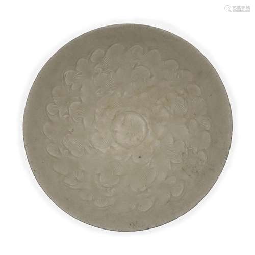 A Chinese carved qingbai 'clouds' bowl<br />
<br />
Southern...