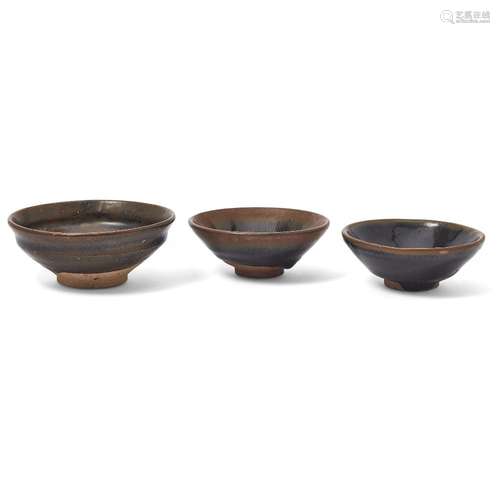 Two Chinese Jian 'hare's fur' tea bowls and a brown-glazed t...