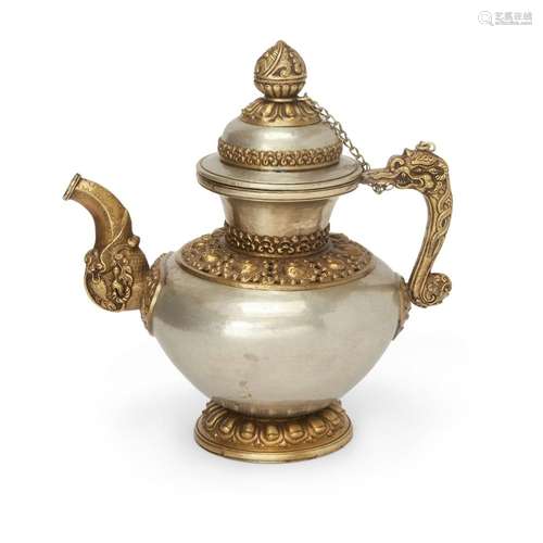 A large Tibetan white metal and copper teapot<br />
<br />
1...